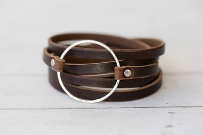 Handmade Sterling Silver Hoop Full Grain Leather 6 strip bracelet wrap. Solid Brass rivets with a solid brass button stud closure. Rustic Brown USA Horween leather. Personalize your bracelet by picking your leather color and custom sizing.